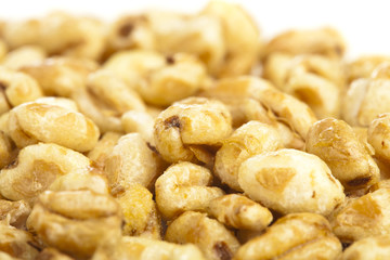extreme closeup of sweets corn cereals bowl