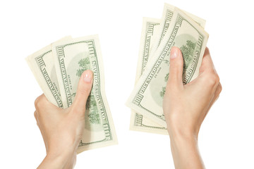 Female hands counting money, isolated on white background