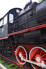 wheel of the old locomotive on stop
