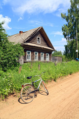 Fototapeta na wymiar old bicycle on rural road