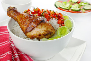 Fried chicken leg with rice and vegetables
