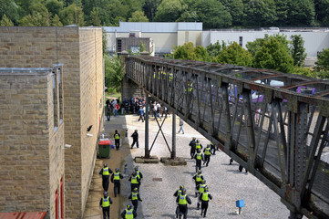 Police officers and protesters clash at the EDL demonstration in Halifax