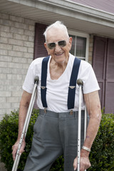 Elderly Man With Crutches