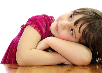 Beauty little girl on a table