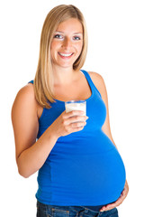 Pregnant woman with glass of milk isolated on white