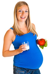 Pregnant woman with vegetables, isolated on white