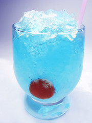 alcoholic blue curacao liqueur cocktail with cherry