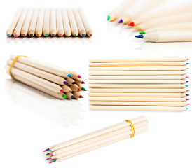 Fototapeta premium many colored pencils in row over white background