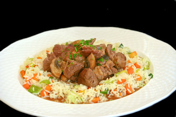 Rindsvoressen  mit Gemüsereis