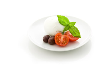 Tomato Mozzarella appetizer on white isolated background