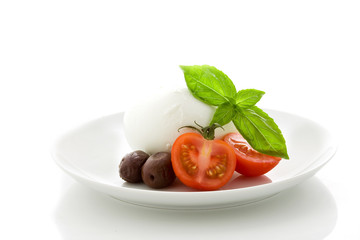 Tomato Mozzarella appetizer on white isolated background