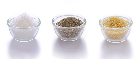 close up of salt, pepper and brown sugar