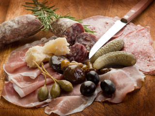 italian appetizer with salami, grana,speck,mushroom,cucumber