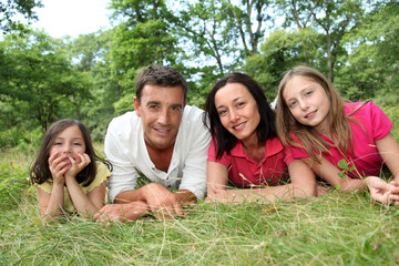 Portrait of happy family in countryside
