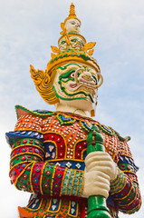 Guardian statue at the temple in Thailand .