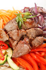 meat with vegetables and noodles