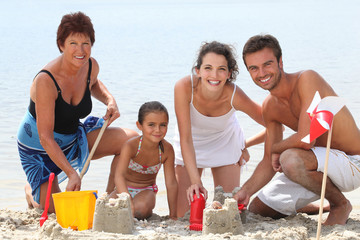 Family having fun at the beach