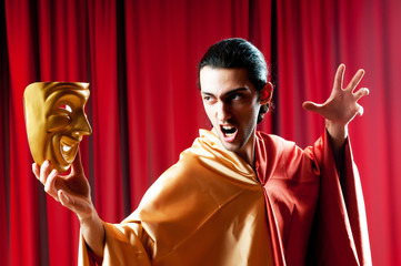 Actor with maks in a funny theater concept