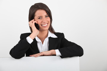 Smiling woman on the phone