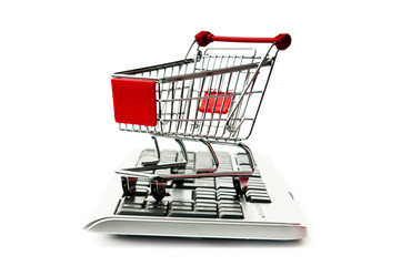 Internet online shopping concept with computer and cart