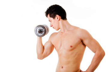Fototapeta na wymiar Powerful muscular young man lifting weights