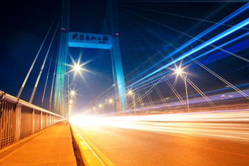 night traffic on the highway bridge