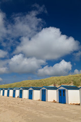 Fototapeta na wymiar A row of cabins on the beach