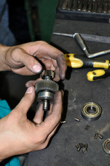 Hands repair auto parts