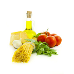 Ingredients for Italian cooking: basil, tomato, parmesan, garlic