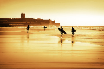 Surfers silhouettes