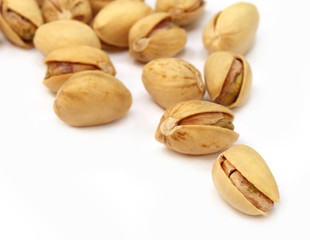 Pistachios isolated over white background