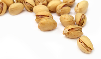 Pistachios isolated over white background