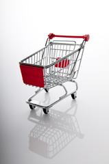 Shopping cart against the  background