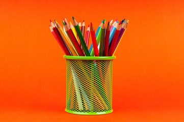 Colourful pencils on the background