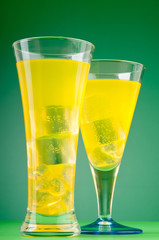 Colourful cocktail in glasses with ice