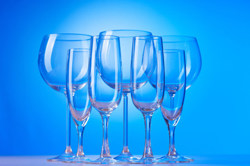 Wine glasses against gradient background