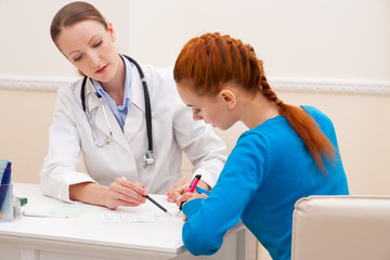 Doctor advises woman patient