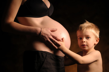 Pregnant woman and her son