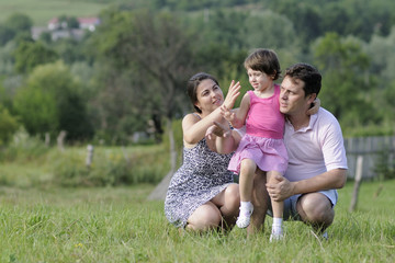 Fototapeta premium beautiful family admiring fields