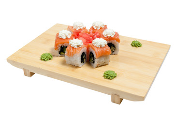 Sushi on wooden stand