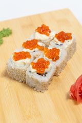 Sushi on wooden stand