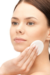 beautiful woman with cotton pad
