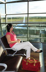 Fototapeta premium Brunette on the airport