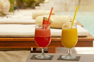 Pair of fruit shakes on the tropical beach
