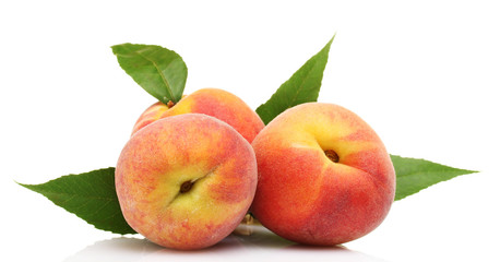 Fresh peaches isolated on white