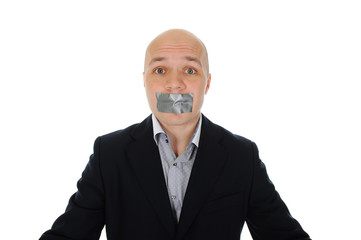 Businessman with mouth sealed
