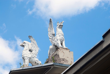Griffin sculptures on the old house in Vilnius, Lithuania
