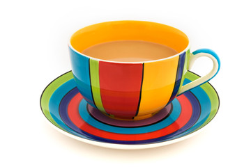 Stripy cup and saucer isolated on white