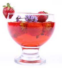 Jelly with strawberries decorated with a lavender twig