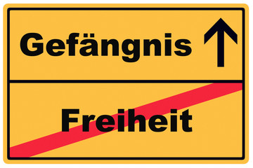 Schild Freiheit und Gefängnis
